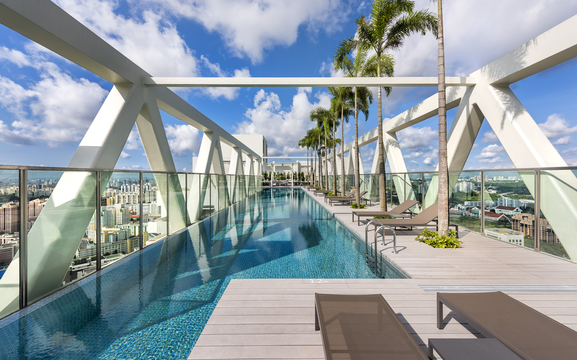 Singapore's Newest Residential Building Features Sky Bridges and an  Unbelievable Sky Pool